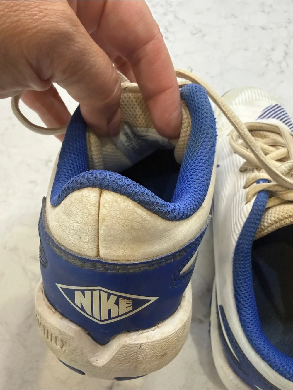 Nike Kids White and Blue Cleats, Size 2
